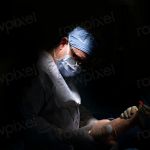Plastic surgeon prepares a patient
