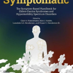 A book cover of Symptomatic with an illustration of a person sitting in between pieces of a puzzle